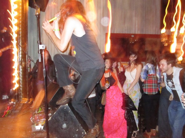 Eddie B. Gieda III of An Albatross with his back to the crowd at Union Pool.