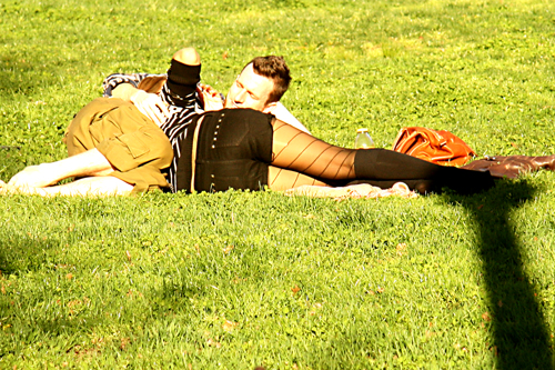 couple lying down in park eric wolman