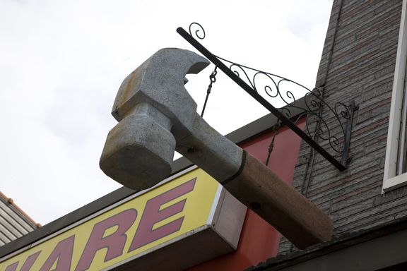 Styrofoam hammer signage created by Stanley Wisniewolski in the 1980s. It still hangs over Crest Hardware on Metropolitan Avenue.