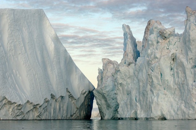 Massive icebergs photographed in Greenland. PHOTO BY JAMES BALOG / EXTREME ICE SURVEY