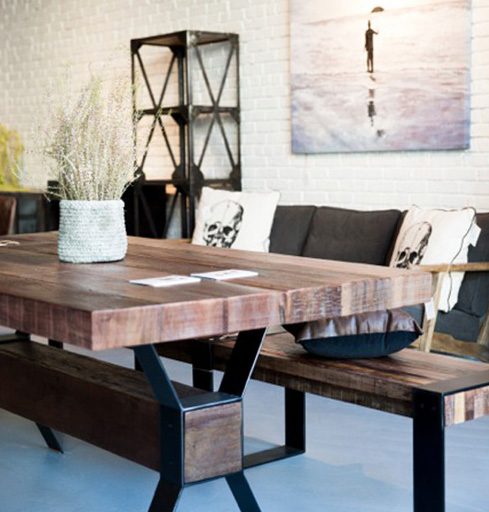 Table made with reclaimed wood sourced from French Colonial buildings in Vietnam