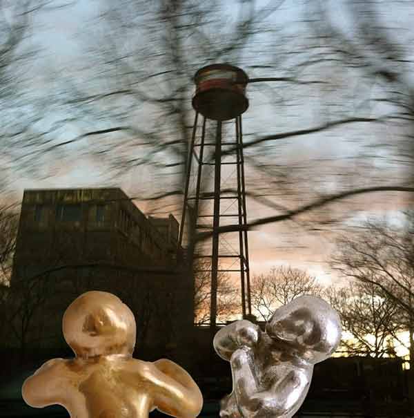 brooklyn bambini sculptures in front of water tower